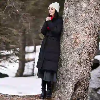 佐丹奴 腰带收腰连帽梭织长款羽绒服 女款