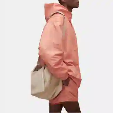 Fear of God Essentials FW22 1977 Nylon Coaches Jacket Coral Logo