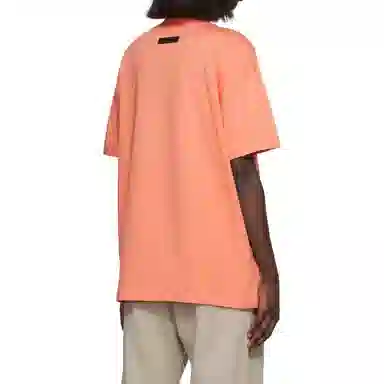 Fear of God Essentials FW22 Womens SS Tee Coral