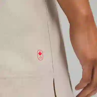 lululemon Team Canada Wovenair High-Rise Short 6"COC logo