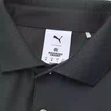 PUMA x REIGNING CHAMP Polo