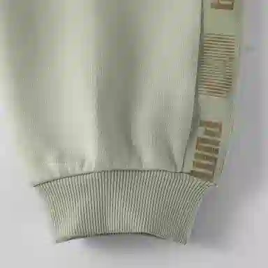 PUMA CLASSICS M FOR MELODY SWEATPANTS DK logo