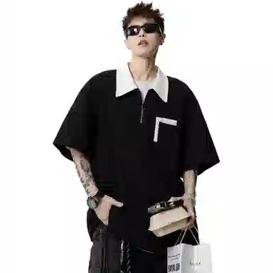 GEOFFREY B. SMALL Polo