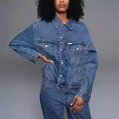 PALACE x Calvin Klein Relaxed Trucker Denim Jacket Tinted Sandstone Indigo