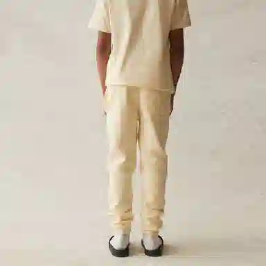 Fear of God Essentials SS21 Kids Sweatpant ButtercreamCream Logo