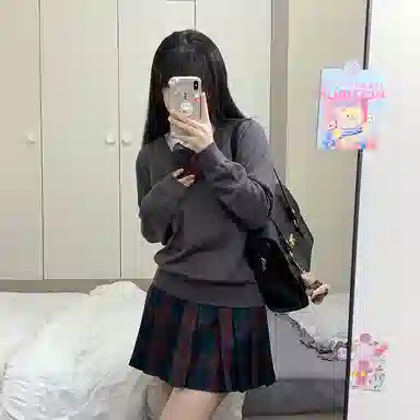 东鲸岁时记 经典学院风格纹百褶短款半身裙 圣诞红格