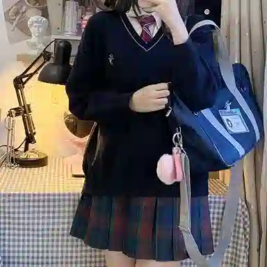 东鲸岁时记 经典学院风格纹百褶短款半身裙 圣诞红格