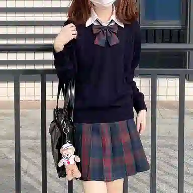 东鲸岁时记 经典学院风格纹百褶短款半身裙 圣诞红格