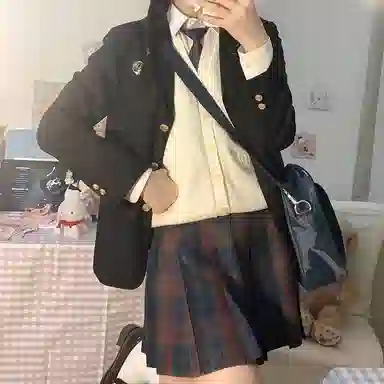 东鲸岁时记 经典学院风格纹百褶短款半身裙 圣诞红格