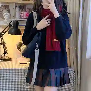 东鲸岁时记 经典学院风格纹百褶短款半身裙 圣诞红格