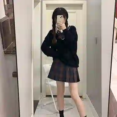 东鲸岁时记 经典学院风格纹百褶短款半身裙 圣诞红格