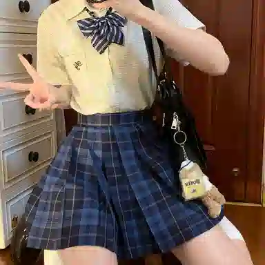 东鲸岁时记 日系复古制服格纹短款百搭学生百褶鲸落半身裙