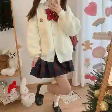 东鲸岁时记 经典学院风格纹百褶短款半身裙 圣诞红格