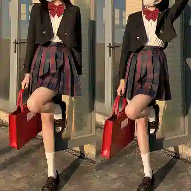 东鲸岁时记 经典学院风格纹百褶短款半身裙 圣诞红格