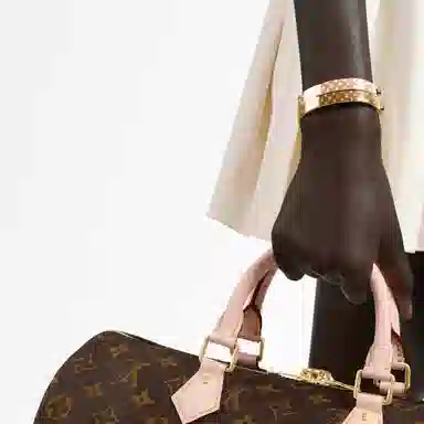 Louis Vuitton Monogram Engraved Brass Bracelet Gold