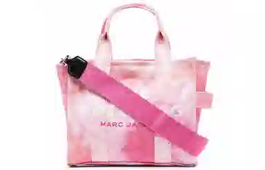 MARC JACOBS MJ The Traveler logo