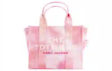 MARC JACOBS MJ The Traveler logo
