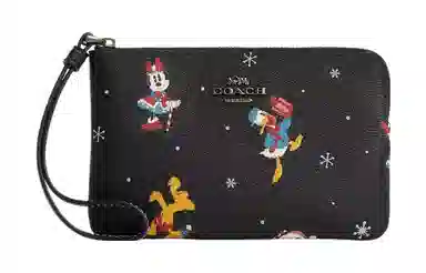 COACH x Disney Corner Zip 16 Logo