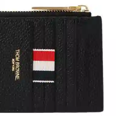 THOM BROWNE LOGO