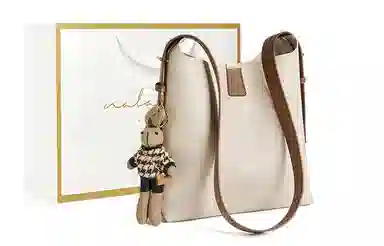 纳兰杜 时尚潮流高级感小众百搭 牛皮 水桶包斜挎单肩包 中号 女款 咖色/米白色