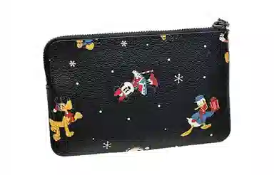 COACH x Disney Corner Zip 16 Logo