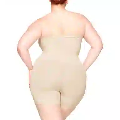 SKIMS Seamless Sculpt Strapless Shortie Bodysuit Sand