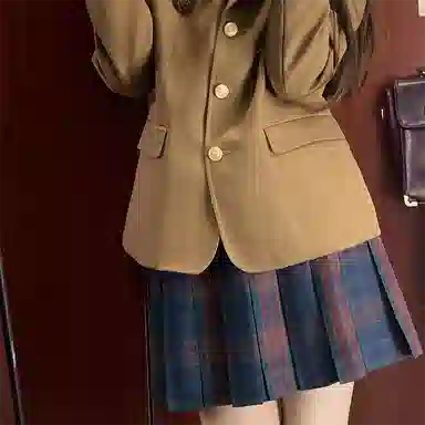 东鲸岁时记 经典学院风格纹百褶短款半身裙 圣诞红格