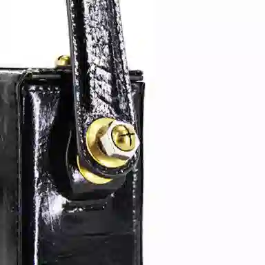 钢板一块黄油水泥黑手提包