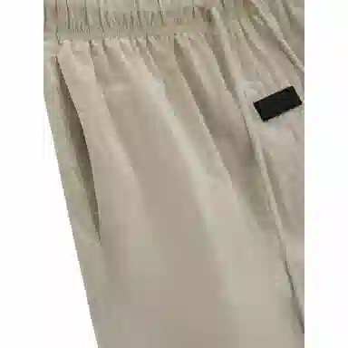 Fear of God Essentials SS24 drop2 Crinkle Nylon Running Short Logo GARDEN YELLOW