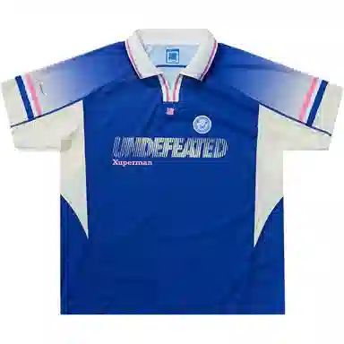UNDEFEATED x Xuperman FW24 Polo