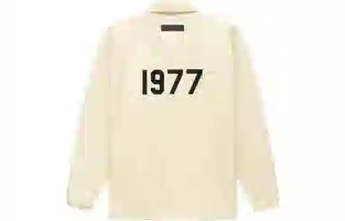 Fear of God Essentials FW22 1977 Nylon Coaches Jacket Egg shell Logo