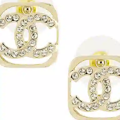 CHANEL Hollow Metal Earrings Gold