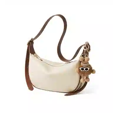 纳兰杜 包包女高颜值潮流百搭休闲高级感简约女包通勤 牛皮 饺子包新月包斜挎单肩包 中号 女款 燕麦色