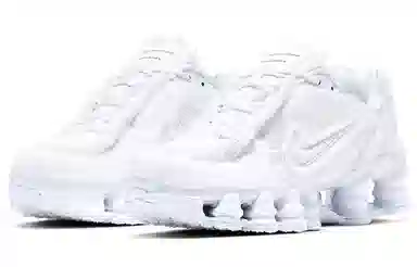 CDG x Nike Shox TL