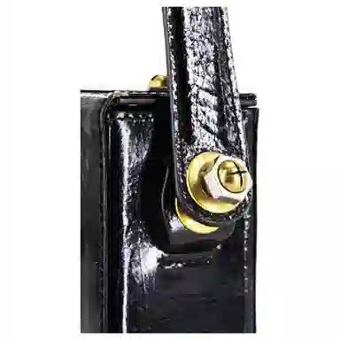 钢板一块黄油水泥黑手提包