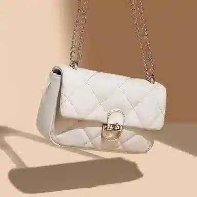 稻草人 华夫菱格休闲百搭通勤游玩包高颜值设计精致小香风 牛皮拼合成革 斜挎包 常规 女款 黑色/白色