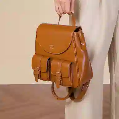 稻草人 高级感复古学院风通勤百搭小众上班 聚氨酯革 双肩包 女款 黑色/黄棕