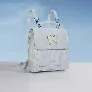 稻草人 小众蝴蝶翩翩设计高质感小众蝴蝶翩翩设计高质感 聚氨酯 手提包书包旅行双肩包 常规 女款 灰蓝/浅杏色/银灰