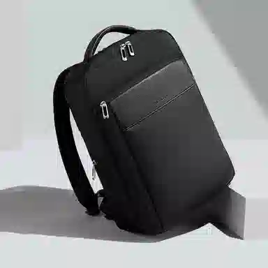 稻草人 轻便出行大容量商务多口袋电脑背包 牛皮 双肩包 常规 男款 黑色