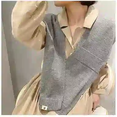 北极绒 针织外搭秋冬季韩版交叉洋气搭肩穿孔小坎肩 披肩 女款