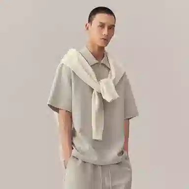 CHINISM Logo Embroidered Half-Zip Polo Shirt