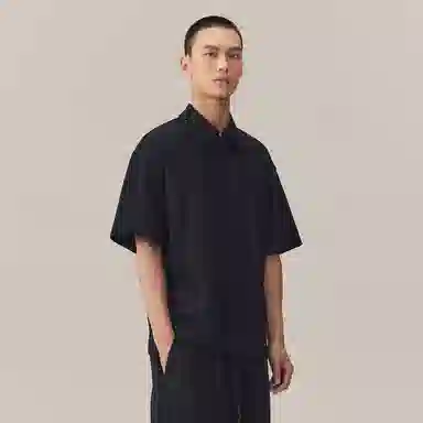 CHINISM Logo Embroidered Half-Zip Polo Shirt