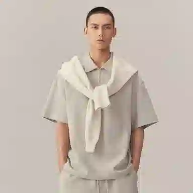 CHINISM Logo Embroidered Half-Zip Polo Shirt