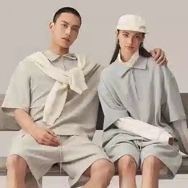 CHINISM Logo Embroidered Half-Zip Polo Shirt