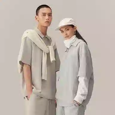 CHINISM Logo Embroidered Half-Zip Polo Shirt