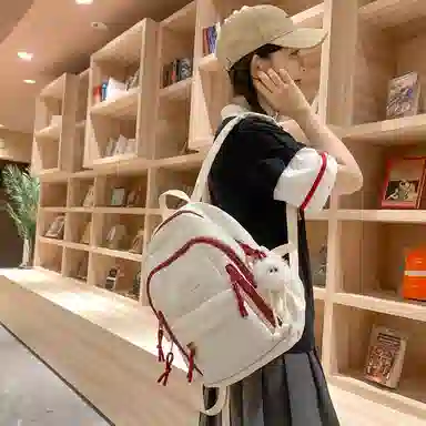 醇龙  尼龙男女通用多色书包大容量学生轻便减负护脊高颜值背包纯色多口袋双肩包