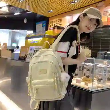 醇龙  尼龙男女通用多色书包大容量学生轻便减负护脊高颜值背包纯色多口袋双肩包