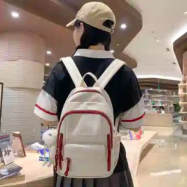 醇龙  尼龙男女通用多色书包大容量学生轻便减负护脊高颜值背包纯色多口袋双肩包