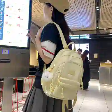 醇龙  尼龙男女通用多色书包大容量学生轻便减负护脊高颜值背包纯色多口袋双肩包