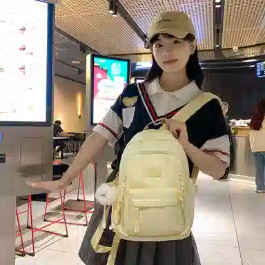 醇龙  尼龙男女通用多色书包大容量学生轻便减负护脊高颜值背包纯色多口袋双肩包